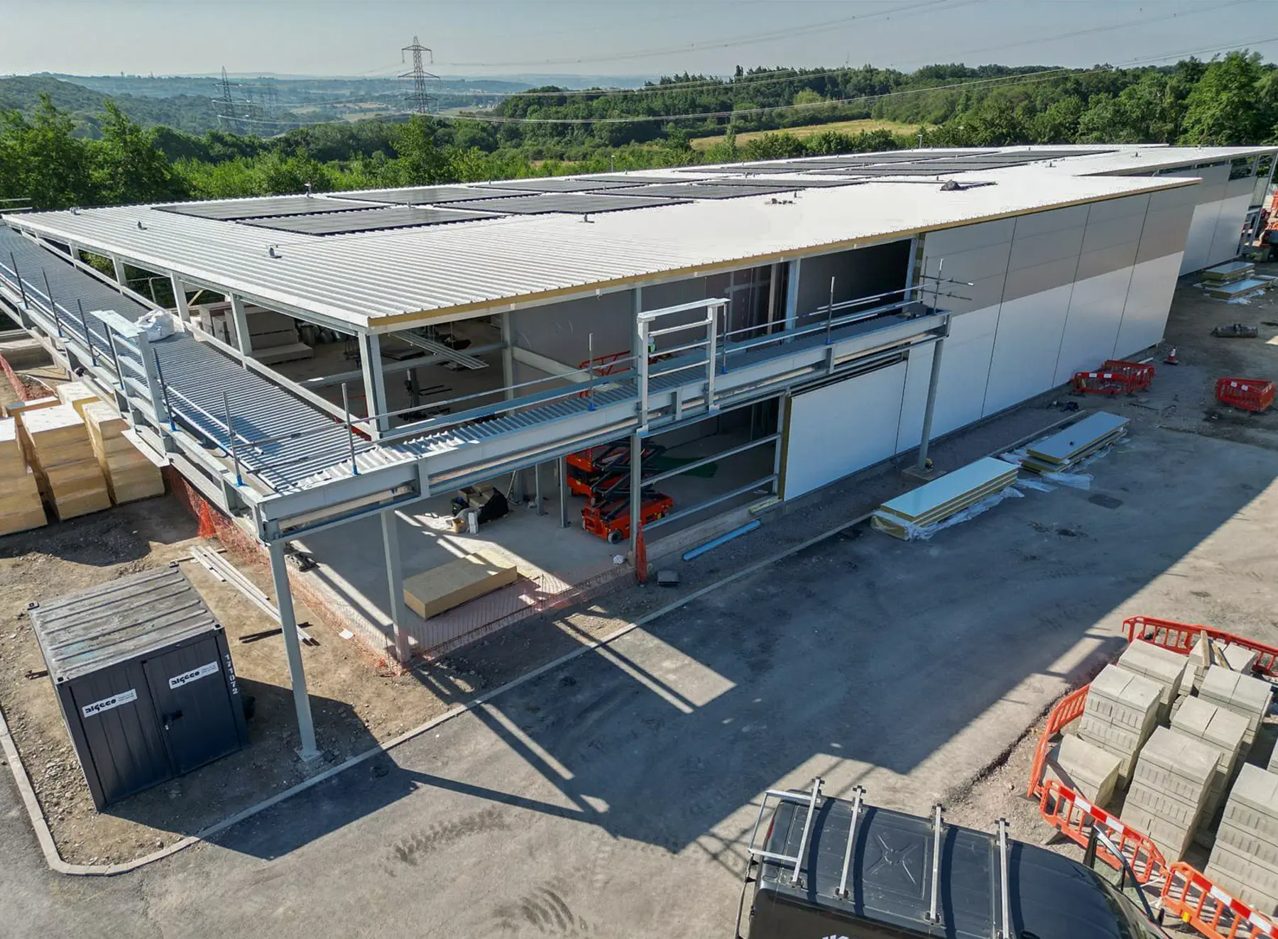 Lidl Birstall store construction showing steel frame, cladding and solar panel installation