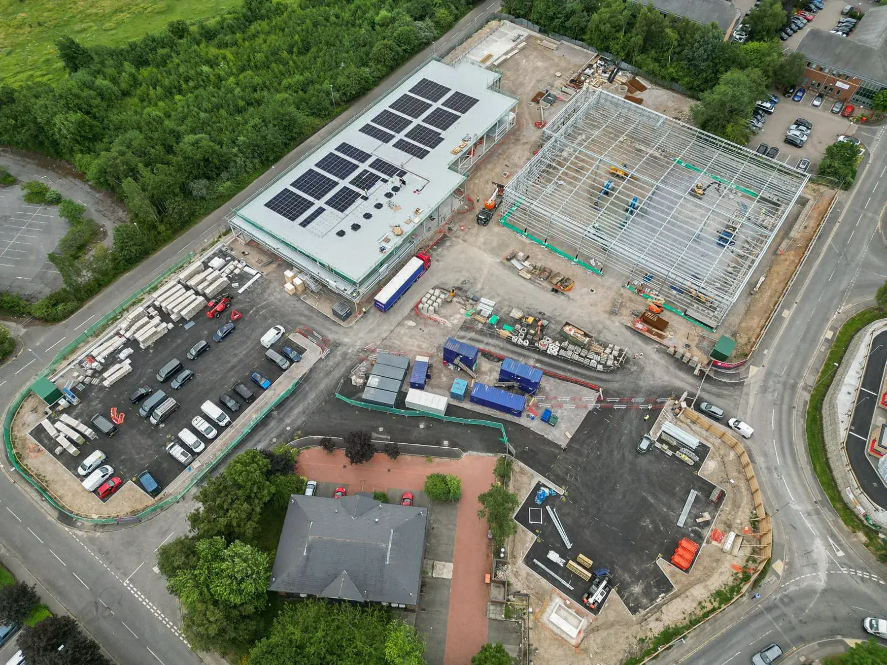 Stonedale-Construction-Lidl-Birstall-Project-2 Aerial view of Lidl Birstall construction site showing new retail buildings and steel frame works