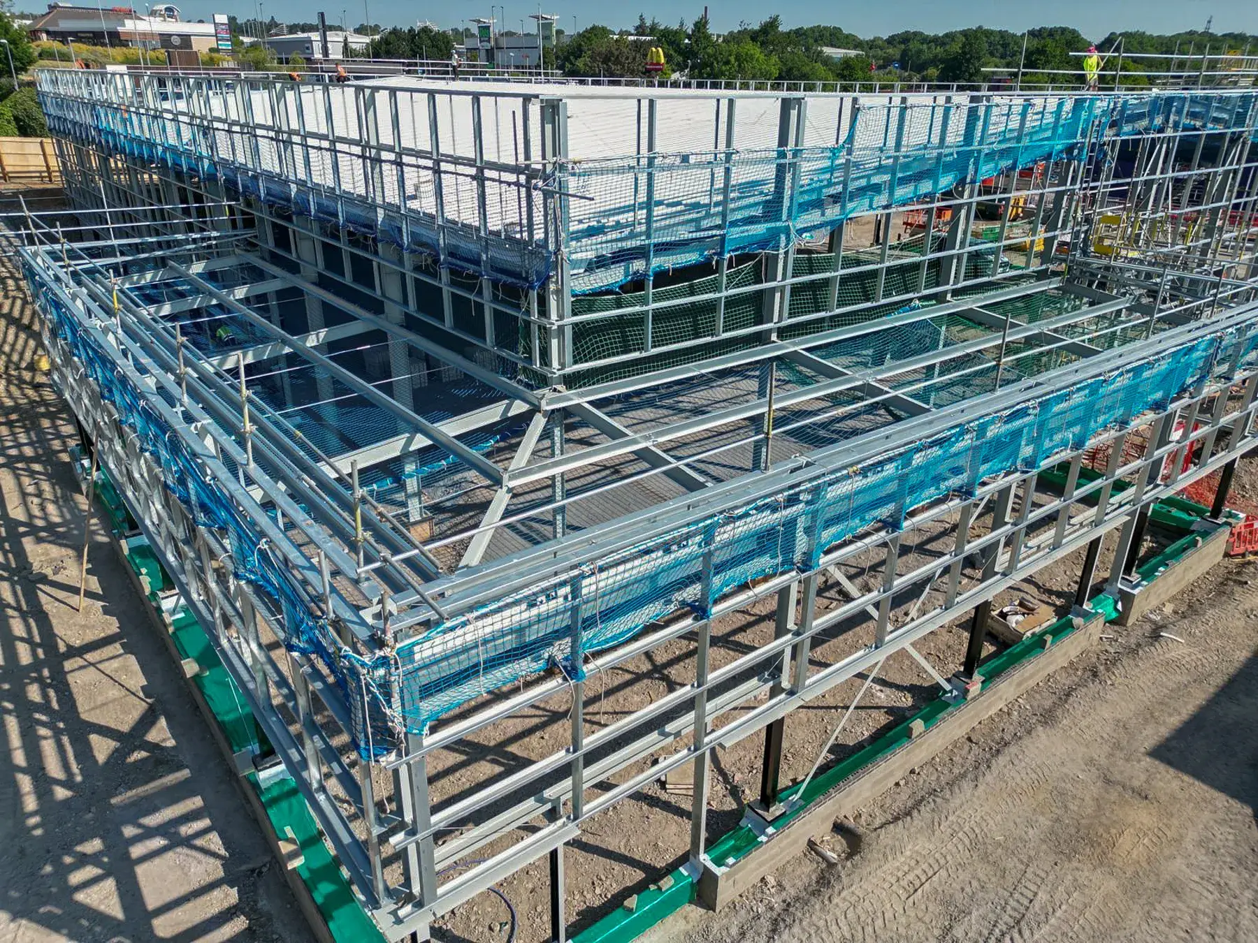 Stonedale-Construction-Lidl-Telford-Project-3 Aerial view of Lidl Telford retail construction with steel frame and roofing works underway
