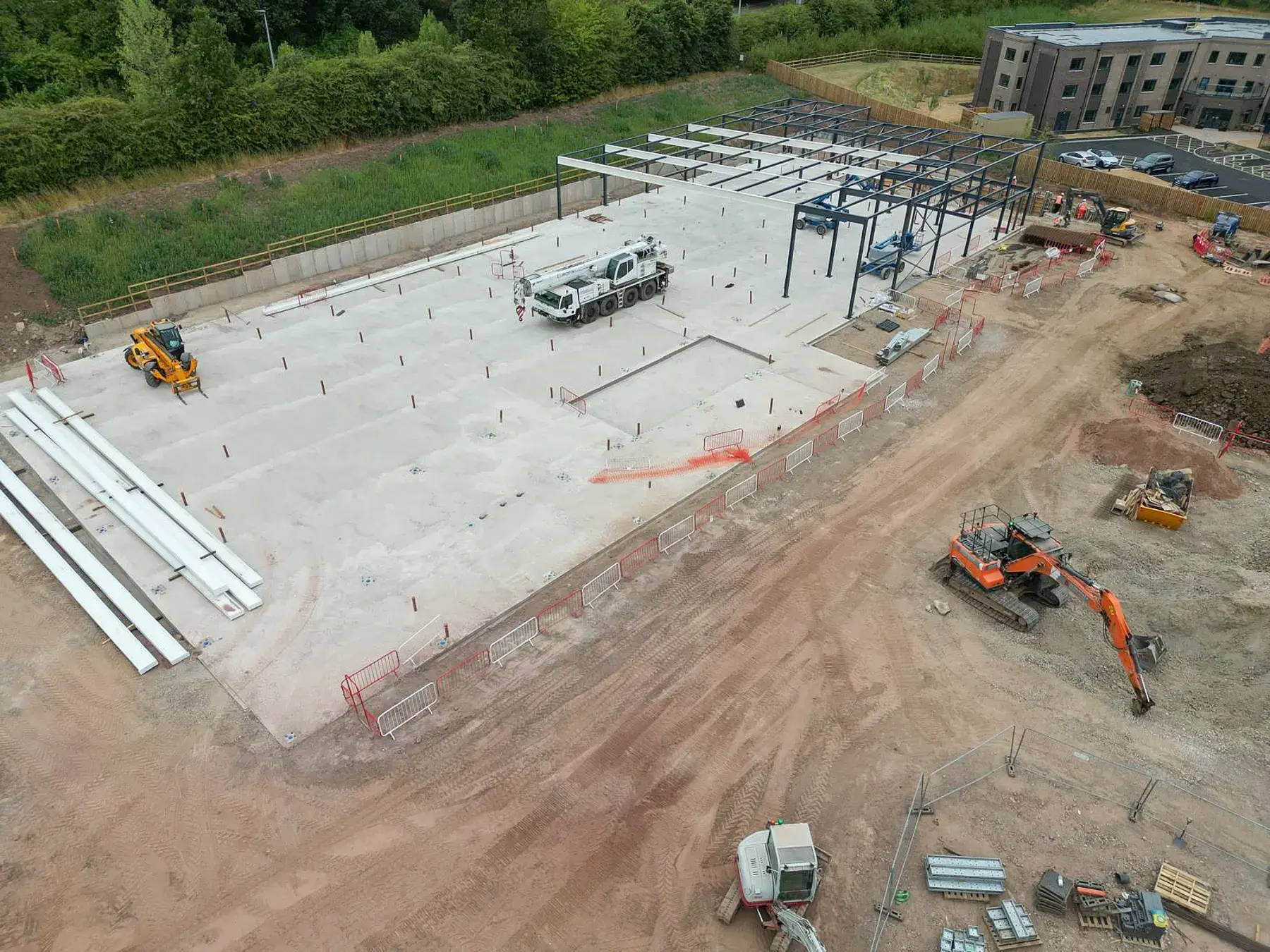 Stonedale-Construction-Lidl-Telford-Project-7 Lidl Telford portal steel frame erection following concrete slab construction